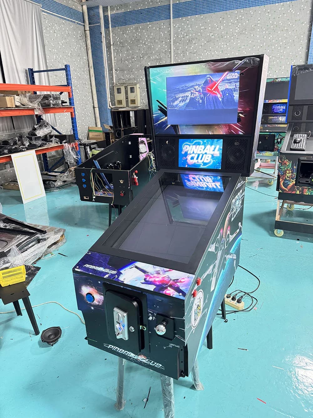 Virtual pinball machine being assembled in the factory