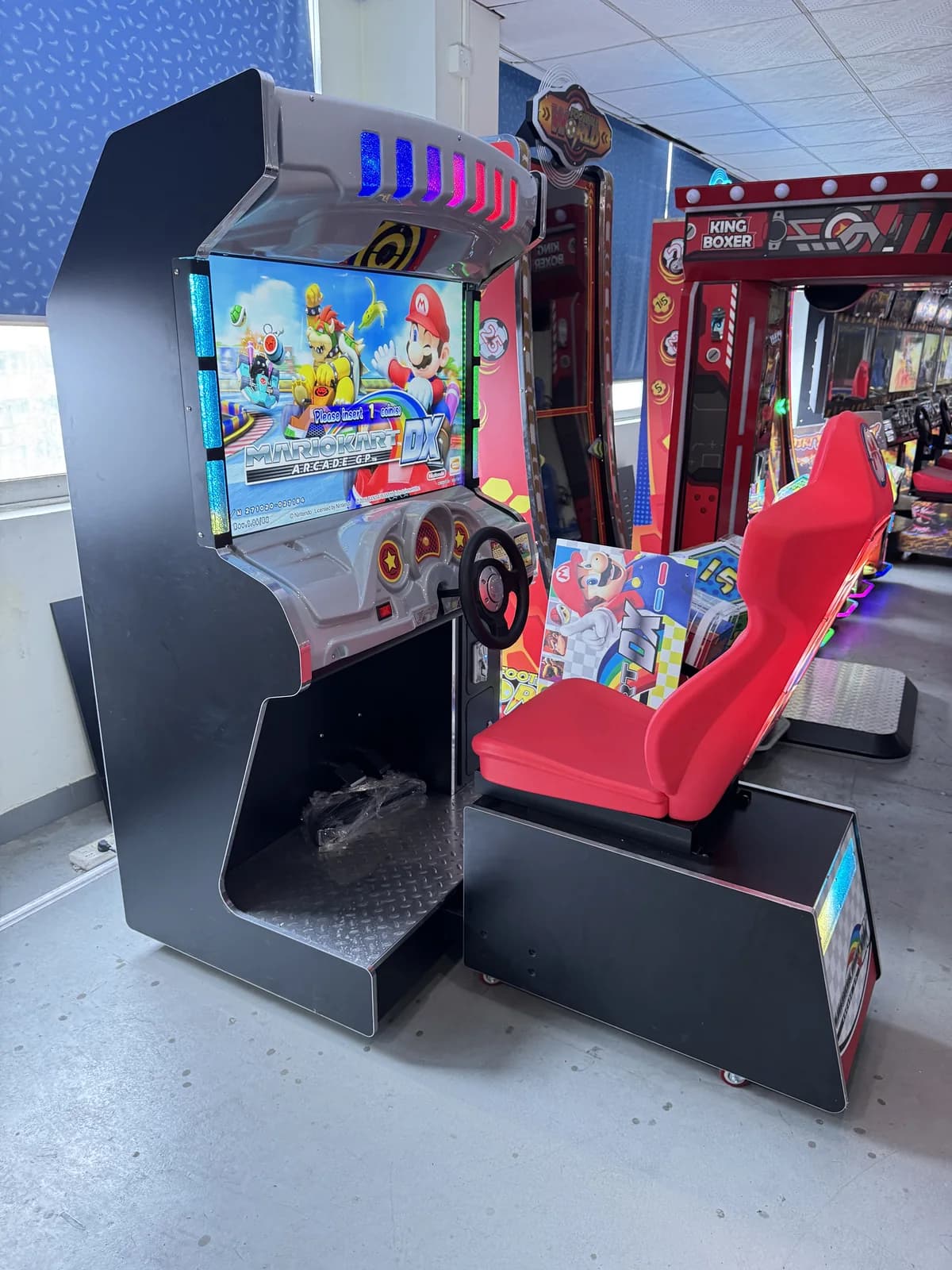 Side view of a single-seat racing arcade cabinet