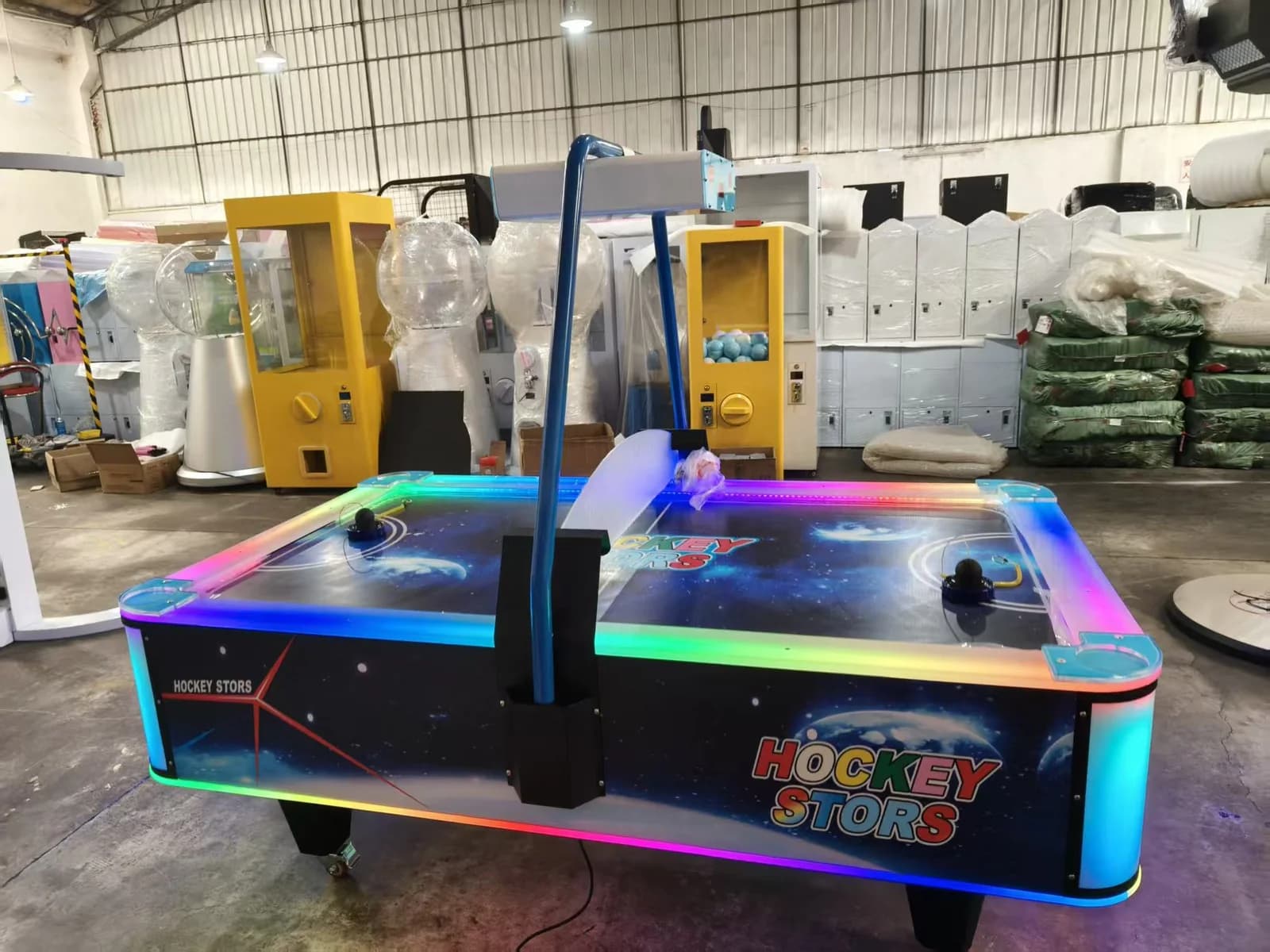 Two-player commercial air hockey table with LED cabinet lighting